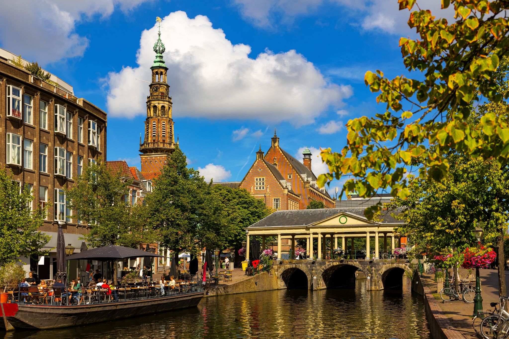 photo of Famous Leiden bridge Koornbrug and Town hall.