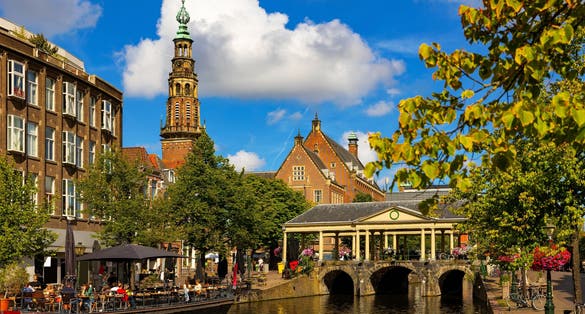 photo of Famous Leiden bridge Koornbrug and Town hall.