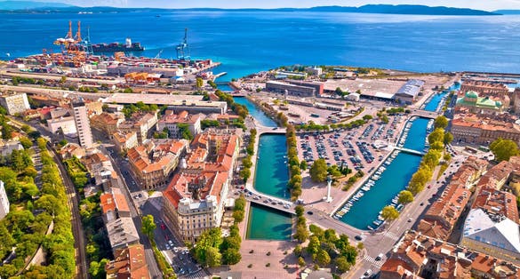 Photo of aerial view of city of Rijeka and Rjecina river, Croatia.
