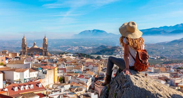 Woman tourist at Jaen, looking at panoramic view of the cathedral- Spain