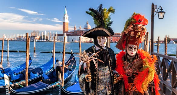 Colorful carnival masks at a traditional festival in Venice, Italy.
