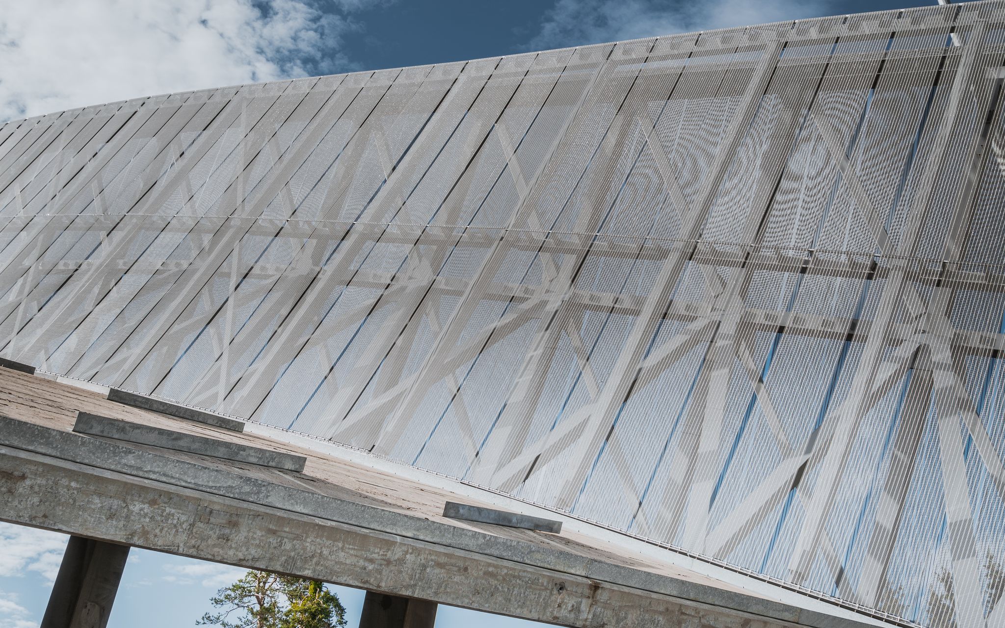 Photo of a close up to Holmenkollen ski jumping stadium and norwegian ski museum in Oslo, Norway.