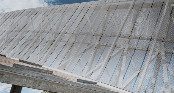 Photo of a close up to Holmenkollen ski jumping stadium and norwegian ski museum in Oslo, Norway.