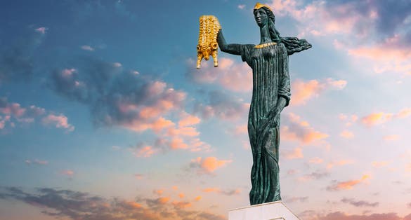 Photo of Statue Of Medea On sunset sunrise Sky Background In Europe Square, Batumi.