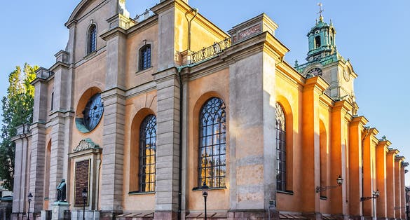 photo of sunny morning view of Storkyrkan in Stockholm, Sweden.