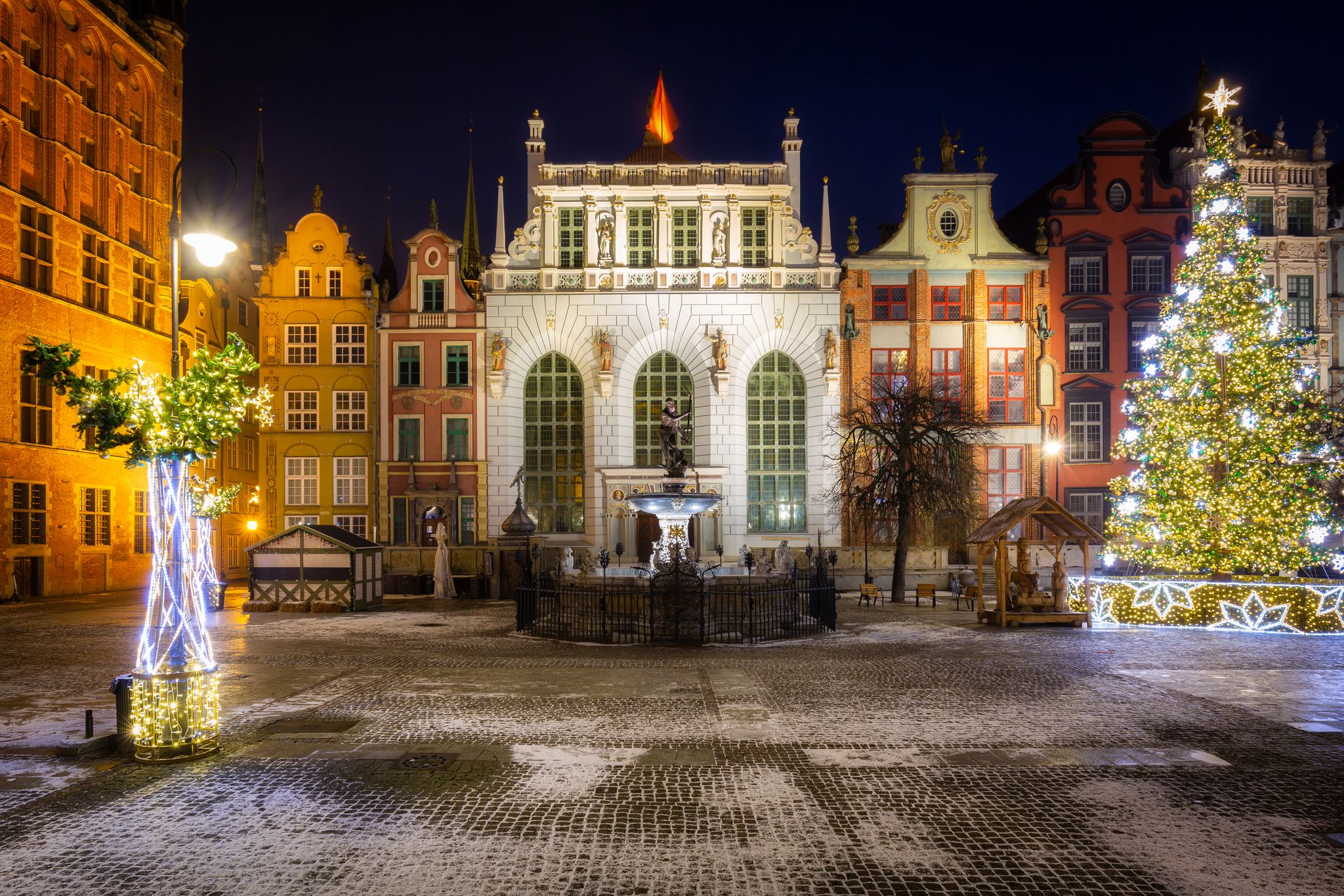 The Artus Court and fountain of the Neptune with christmas tree, Gdansk. Poland.