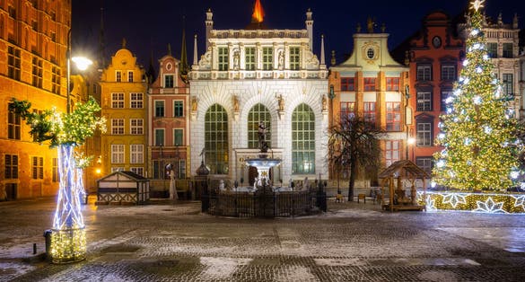 The Artus Court and fountain of the Neptune with christmas tree, Gdansk. Poland.