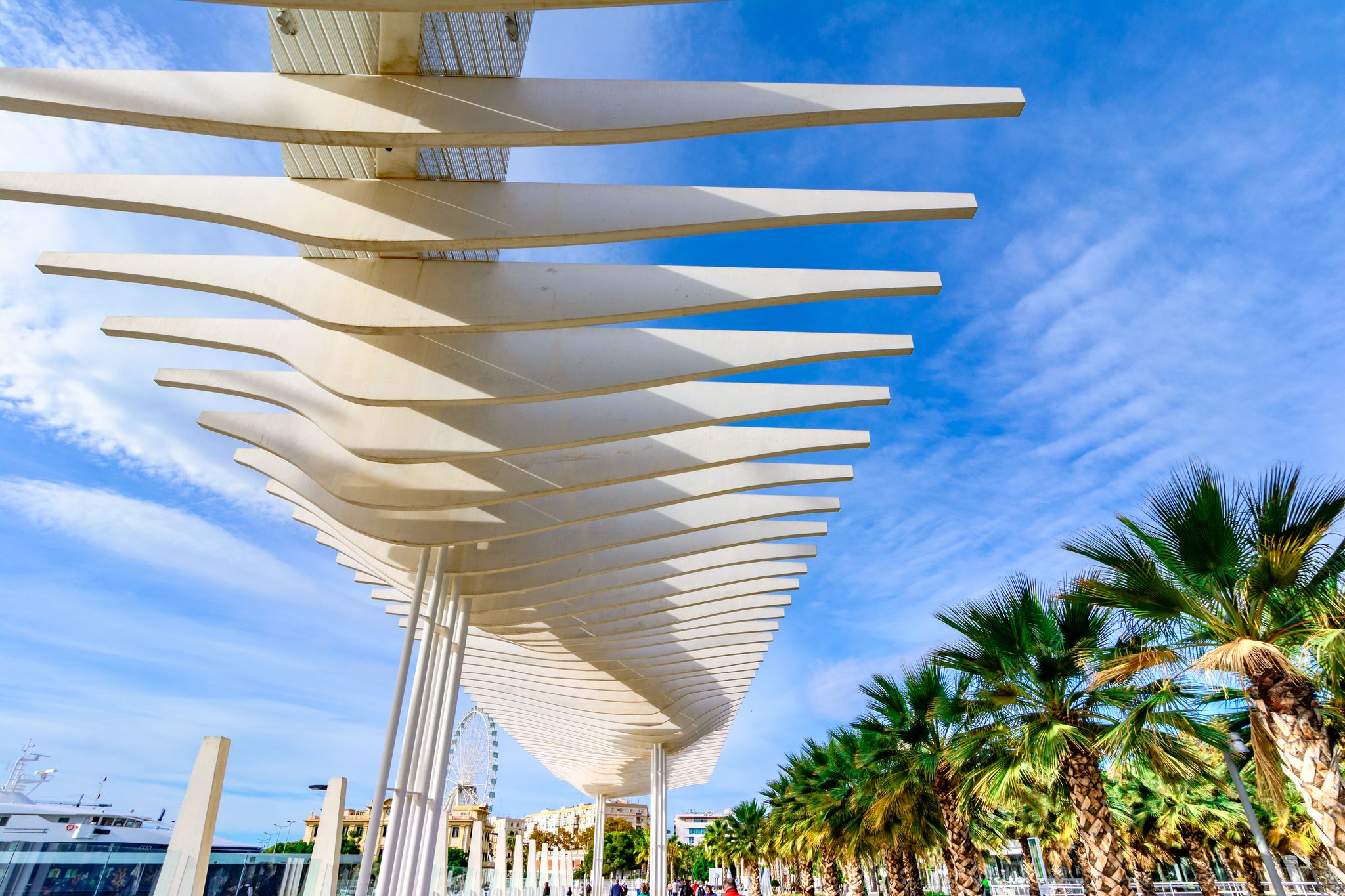 Photo of MALAGA, SPAIN - NOVEMBER 09,2016: Palmeral de las Sorpresas promenade at Malaga, Costa del Sol, Andalusia,Spain .
