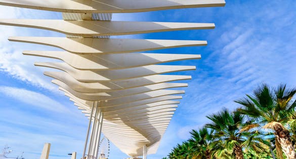 Photo of MALAGA, SPAIN - NOVEMBER 09,2016: Palmeral de las Sorpresas promenade at Malaga, Costa del Sol, Andalusia,Spain .