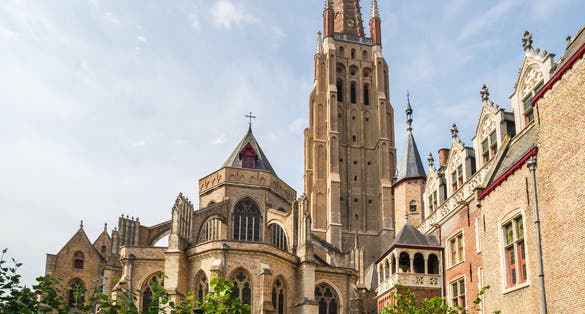 Photo of Afternoon view of the beautiful, medieval Church of Our Lady in Bruges, Belgium.