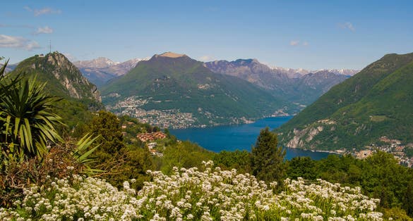 photo of the Parco San Grato in Carona, Switzerland. Alpine mountain scenery on a sunny summer day and views of Lake Lugano.