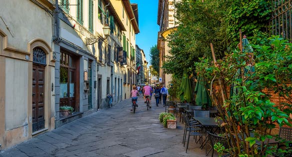 photo of view of   Old cozy street in Lucca, Italy. Lucca is a city and comune in Tuscany. It is the capital of the Province of Lucca