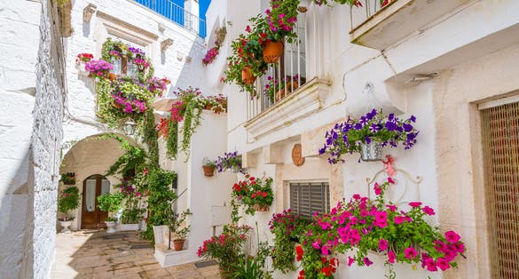 Ostuni white town skyline at sunset, Brindisi, Apulia southern Italy. Europe.
