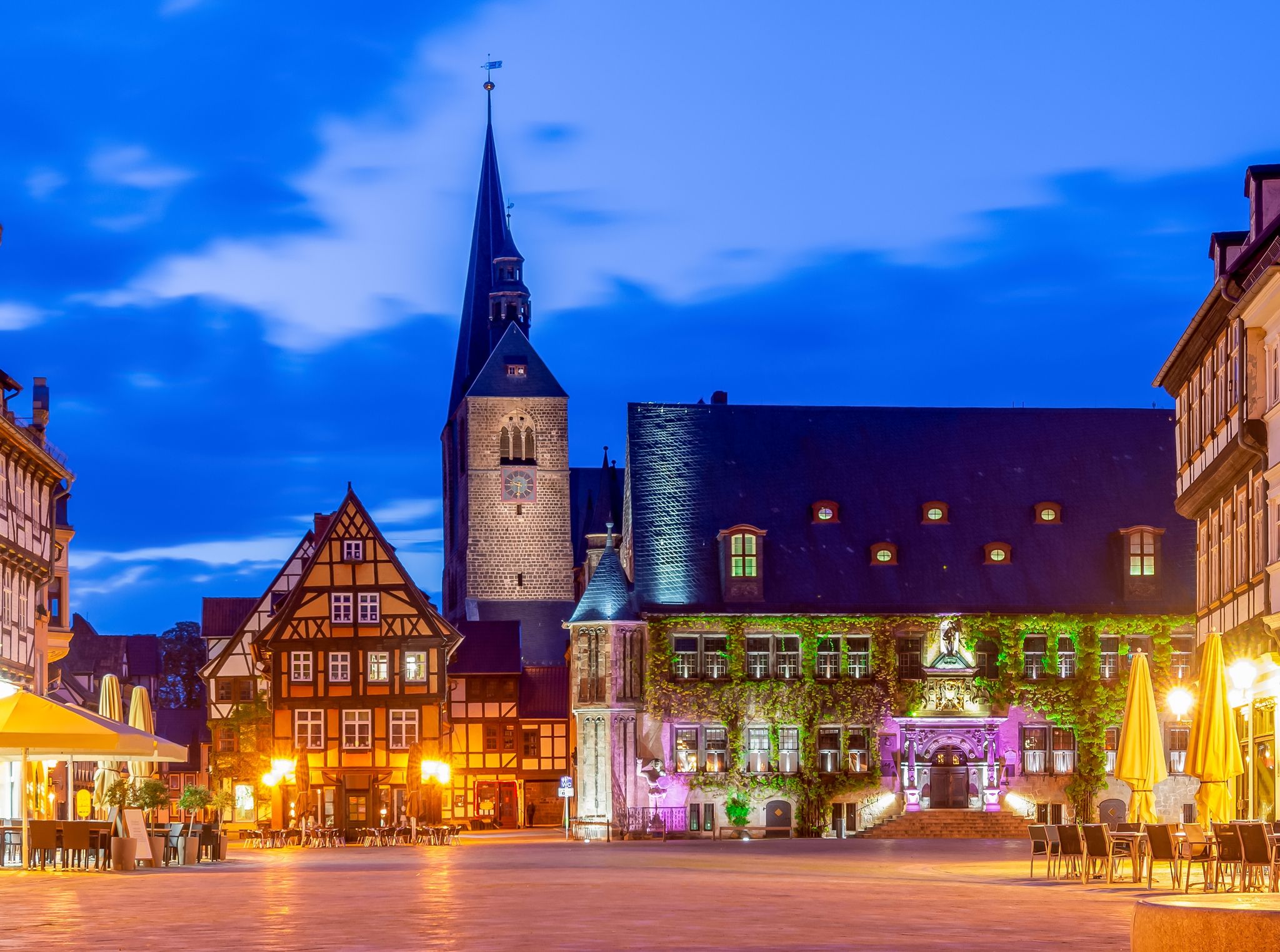 photo of view of Quedlinburg Castle over old town at sunset, Germany