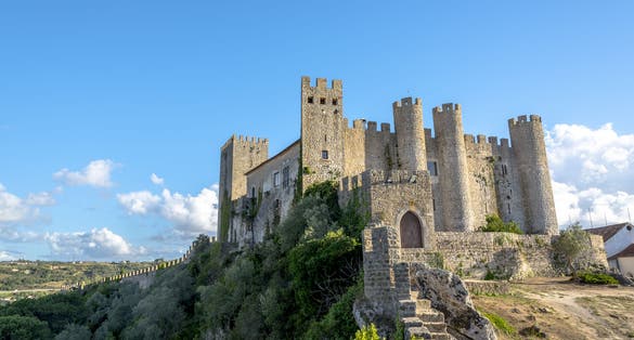 Photo of Stone masonry Castle of Obidos and wall ruins or Castelo de Óbidos is a well-preserved medieval castle located in the civil parish of Santa Maria, Portugal.