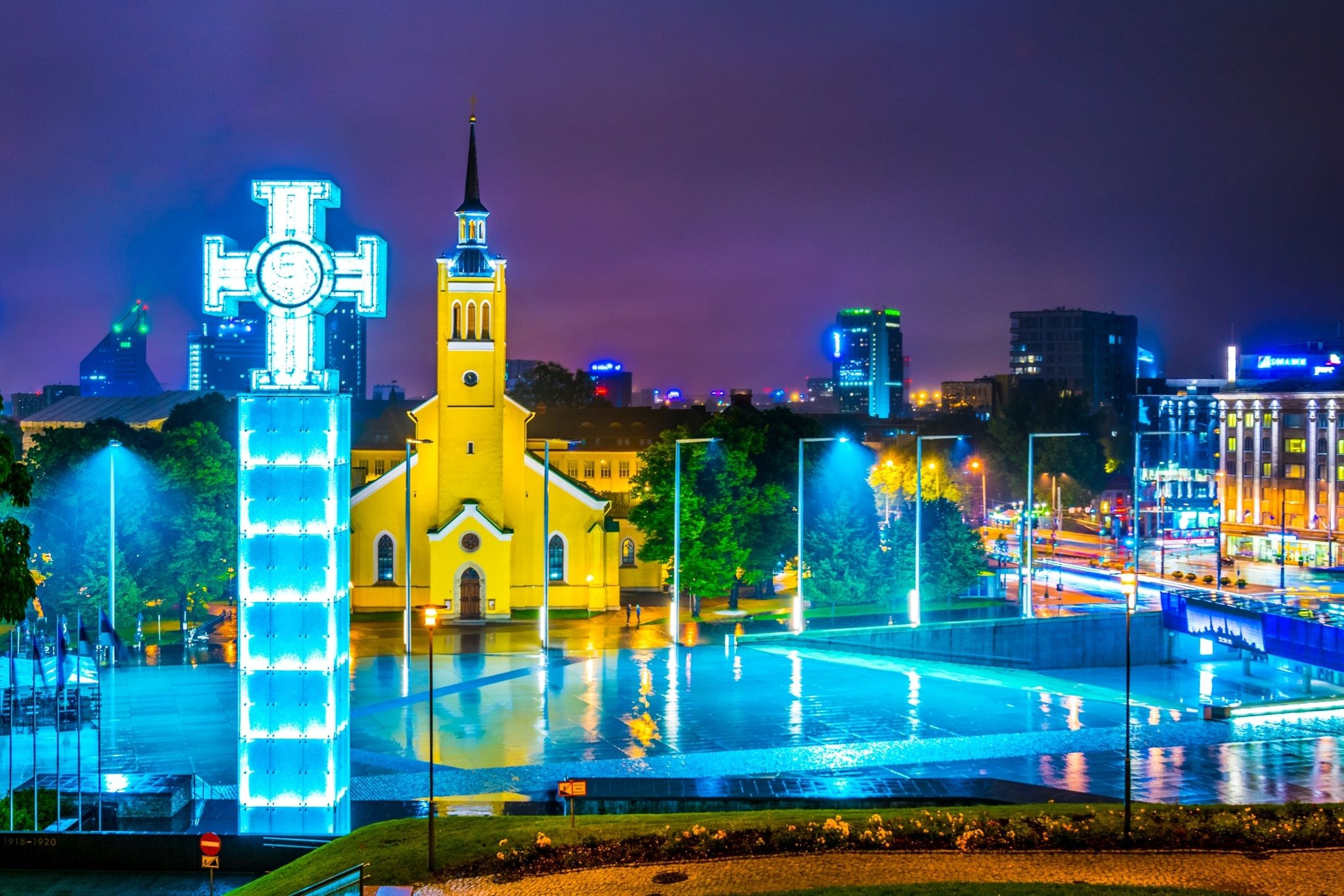 Photo of night view of the Cross of liberty on the freedom square in Tallin, Estonia.