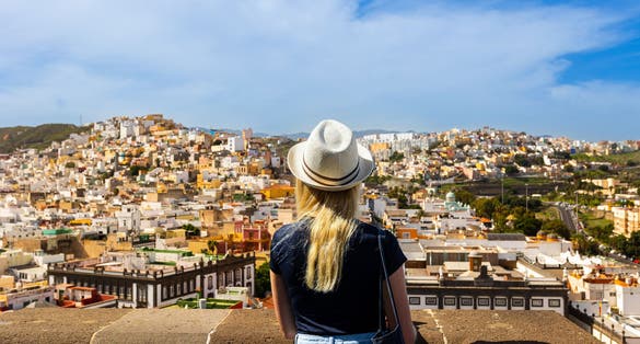 Photo of traveler woman enjoying cityscape Las Palmas Gran Canaria, Spain.