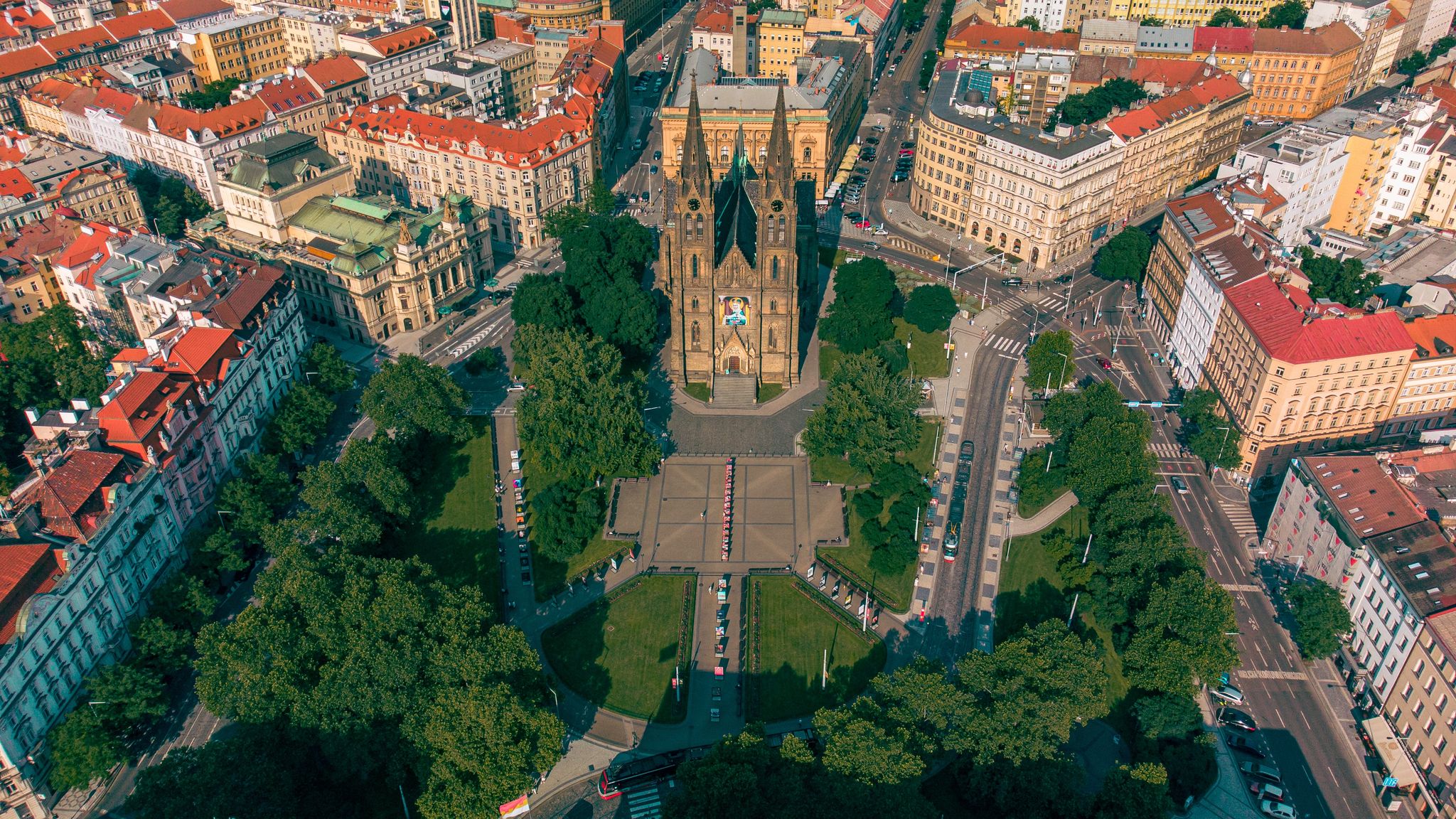 Photo of aerial view of Peace Square (Namesti Miru) Vinohrady Quarter, Vinohrady Theatre and the Cathedral of St. Ludmila at the district of Vinohrady, Prague, Czech Republic.