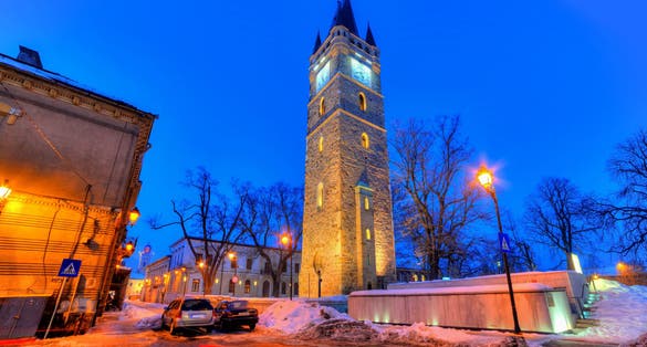 photo of view of Beautiful winter scene in Baia Mare city, with illuminated architecture in downtown, at night, Romania