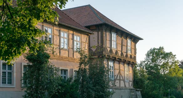 photo of view of old castle of wolfsburg - fallersleben, germany in natural evening light