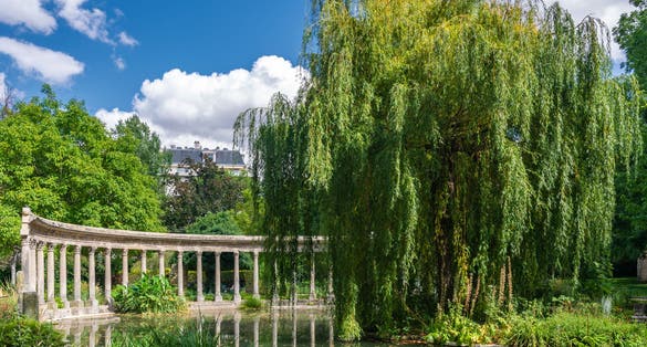 photo of Parc Monceau is a public park located in the 8th arrondissement of Paris, France. At the main entrance is a rotunda. The park covers an area of ​​8.2 hectares.