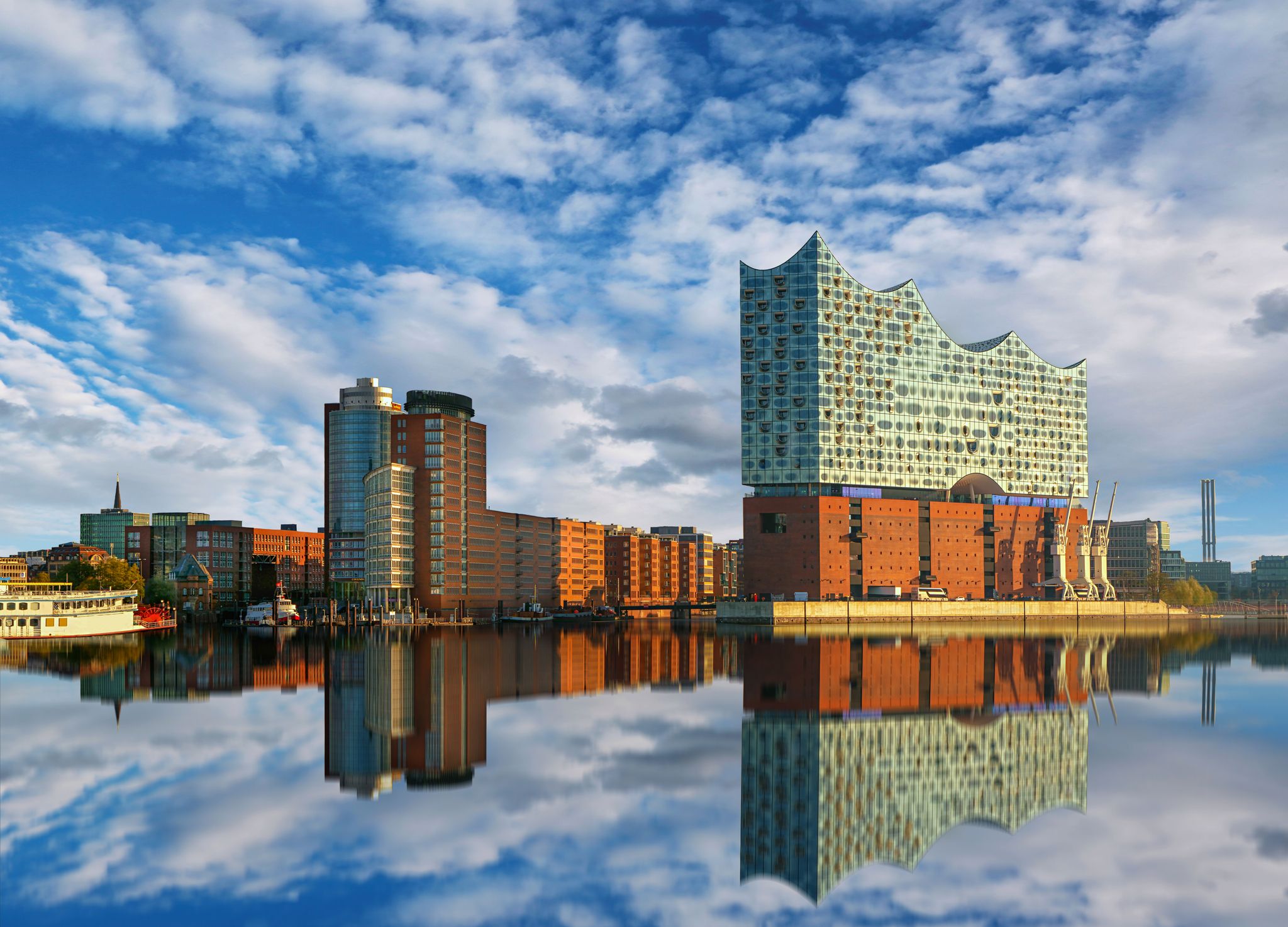 Photo of reflection of the iconic Elbphilharmonie concert hall landmark in Hamburg, Germany.