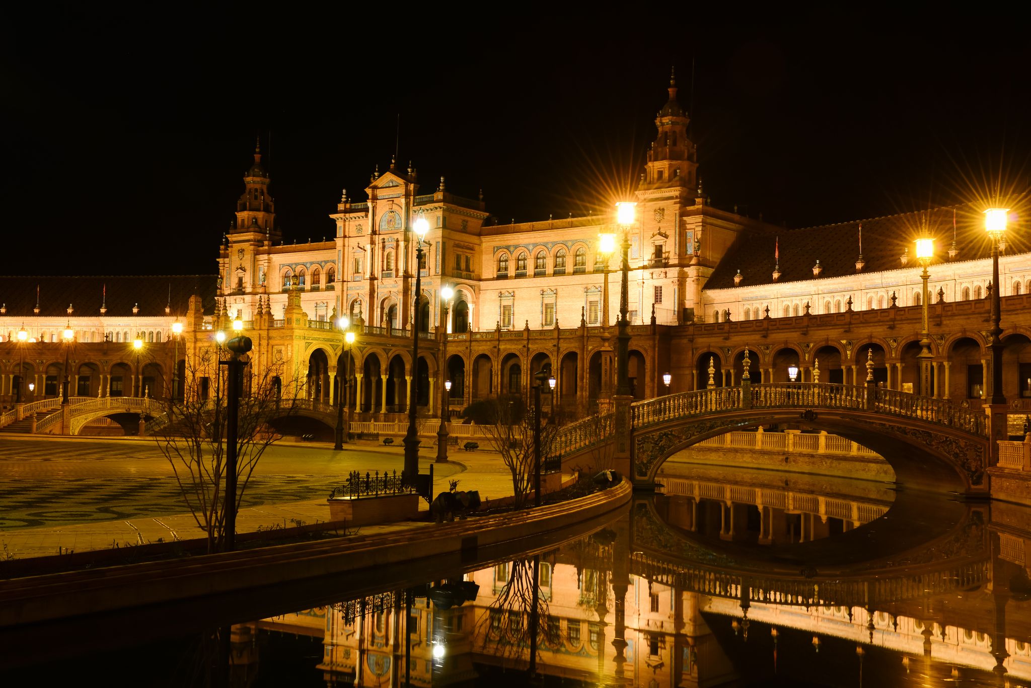 Photo of Plaza de EspaÃ±a (Spain square) at night in Seville, Andalusia .