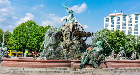 Photo of Neptune fountain (Neptunbrunnen) on Alexanderplatz in Berlin, Germany.