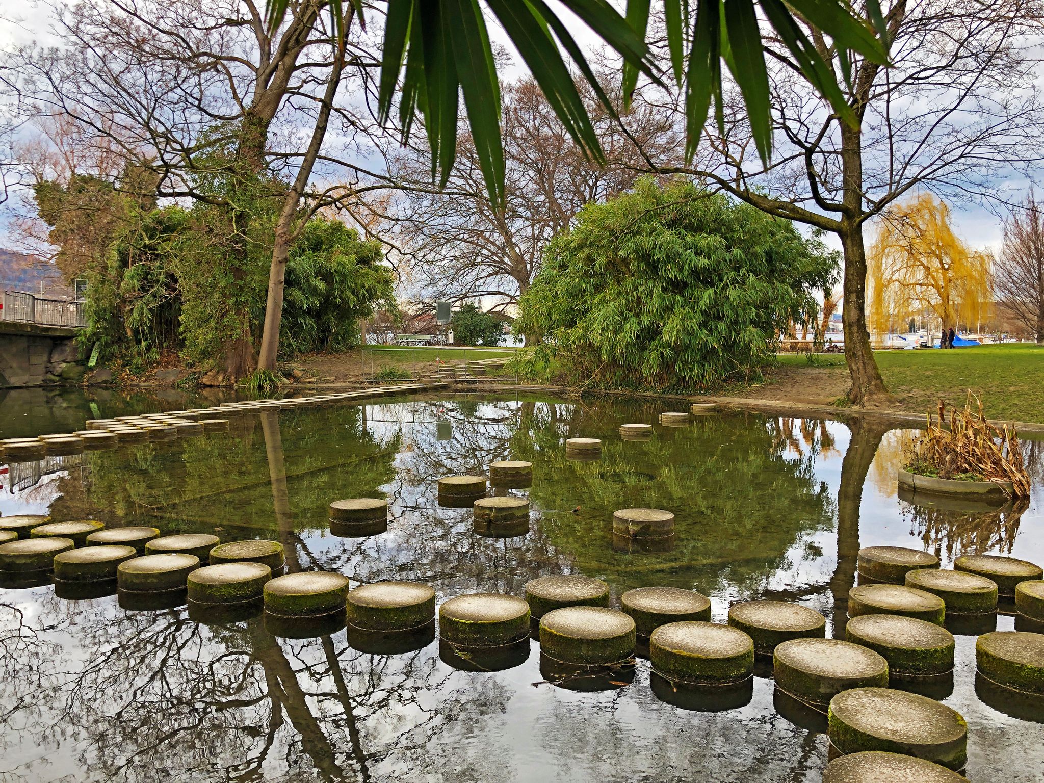 photo of a small pond in the Zurichhorn Park in Zurich, Switzerland.