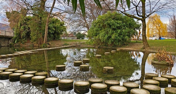 photo of a small pond in the Zurichhorn Park in Zurich, Switzerland.