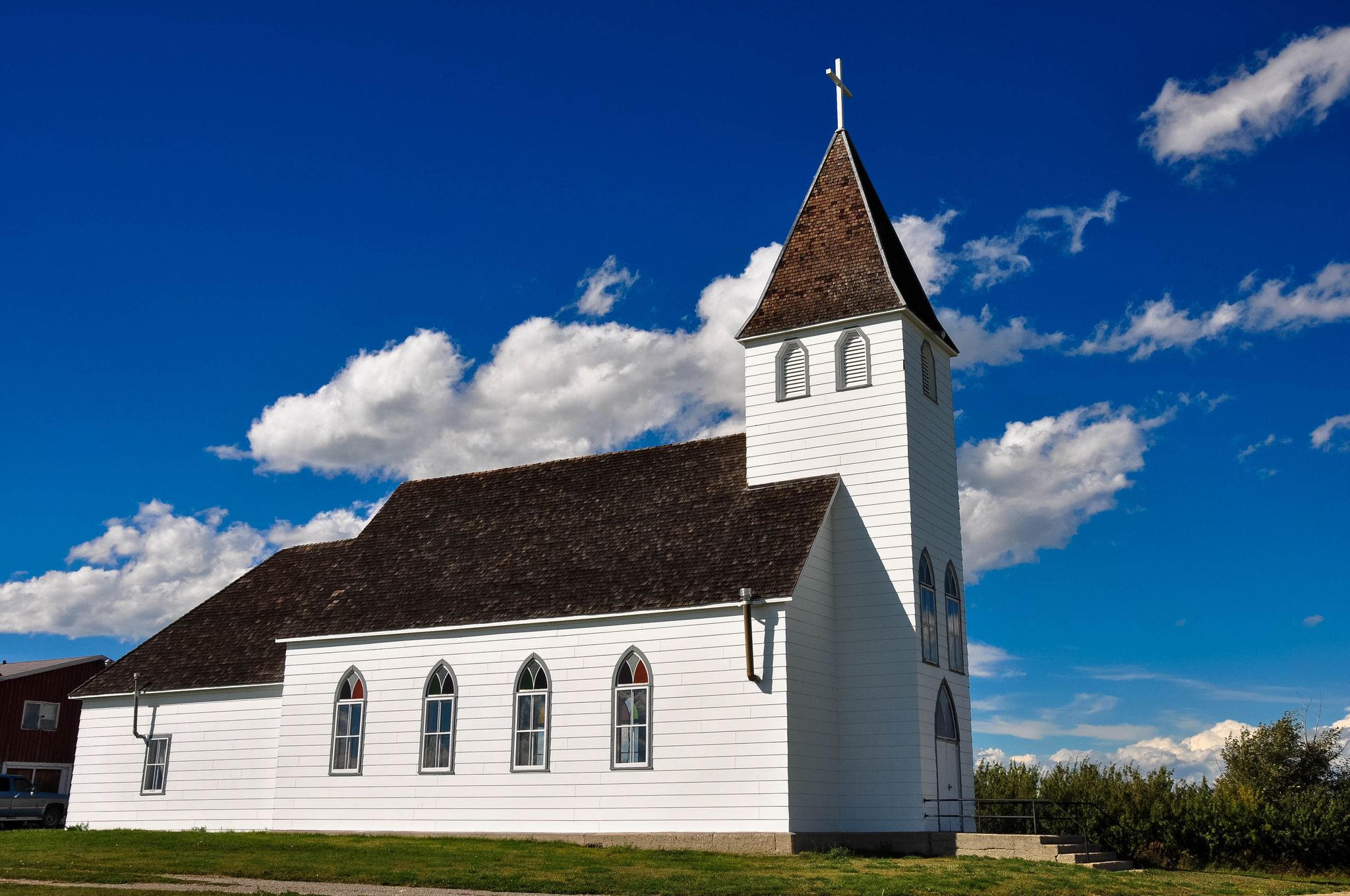 White Country Chapel sunny blue sky.