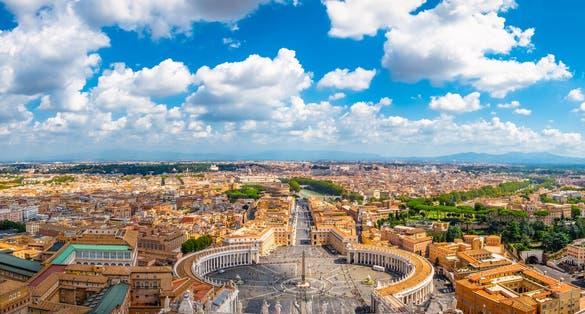 Aerial panorama of St. Peter's Square in Vatican with Rome in the background. Italy.
