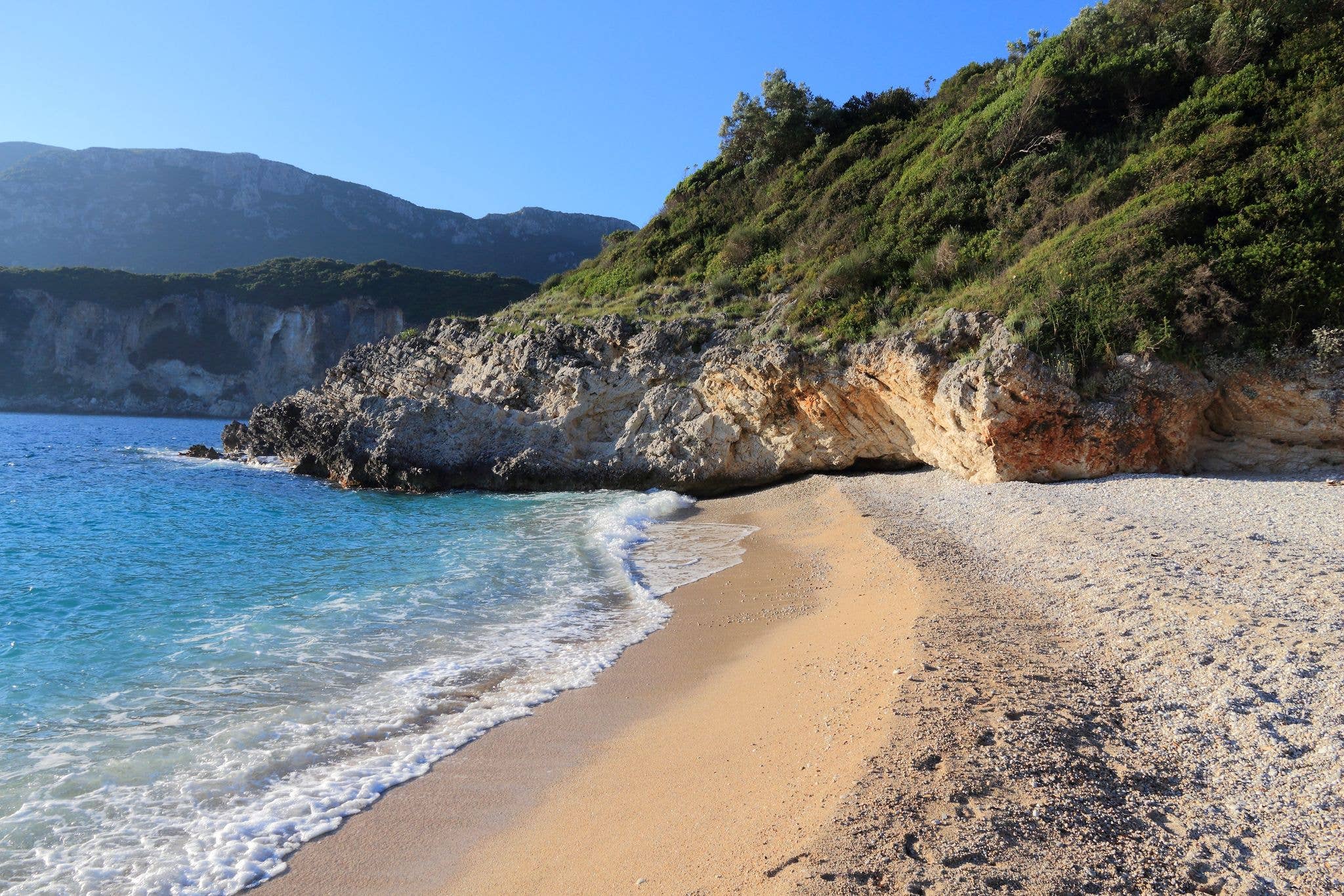 Corfu beach - Greece island nature. Rovinia beach in Liapades.