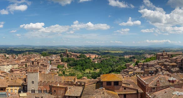 photo of Panorama over Siena as seen from the Museo dell'Opera del Duomo, Tuscany, Italy.