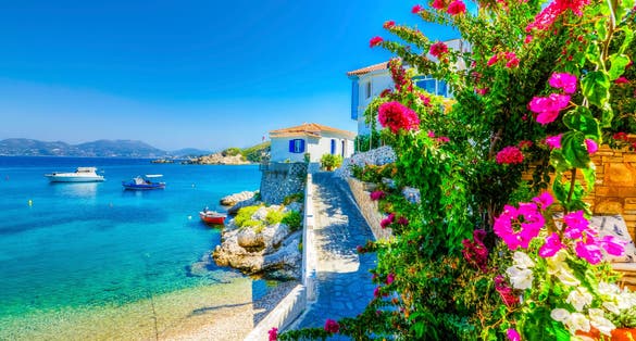 Photo of Kokkari Village beach view. Kokkari Village is populer tourist destination in Samos Island.