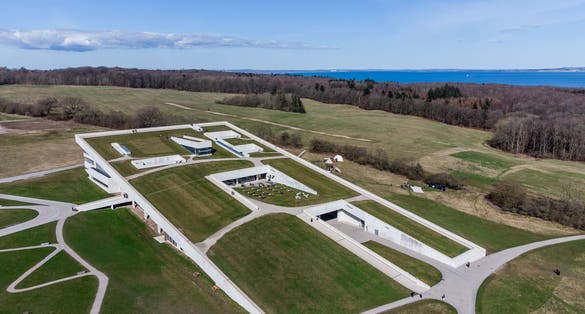 Photo of aerial view of Moesgaard museum is situated at Moesgaard manor in Hojbjerg, a suburb of Aarhus, Denmark. It is a museum dedicated for archeology and ethnography.