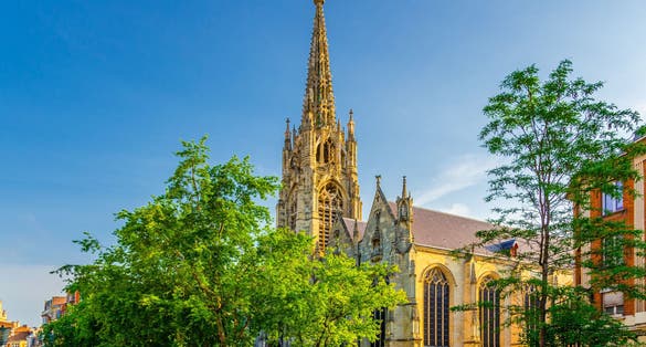 Eglise Saint-Maurice Roman Catholic church Neo-Gothic style building with spire on Rue Pierre-Mauroy street in Lille city historical center, French Flanders, Hauts-de-France Region, Northern France.