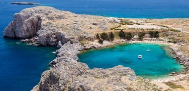 Photo of panoramic aerial view of Lindos bay, village and Acropolis, Rhodes, Greece.
