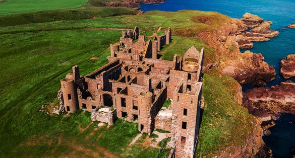 Photo of New Slains Castle in Cruden bay, Scotland, United Kingdom .