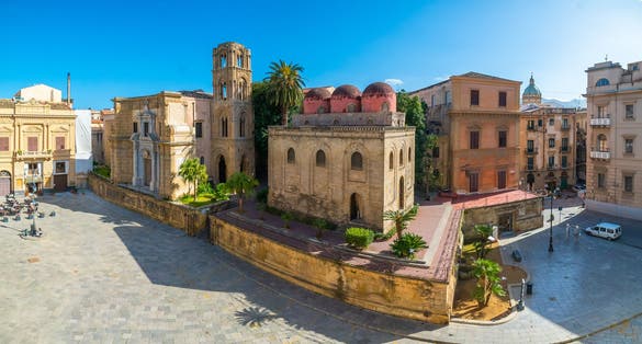 photo of Panoramic view of Bellini Square, Santa Maria dell'Ammiraglio Church known as Martorana Church, San Cataldo church in the center of Palermo visited by many tourists .