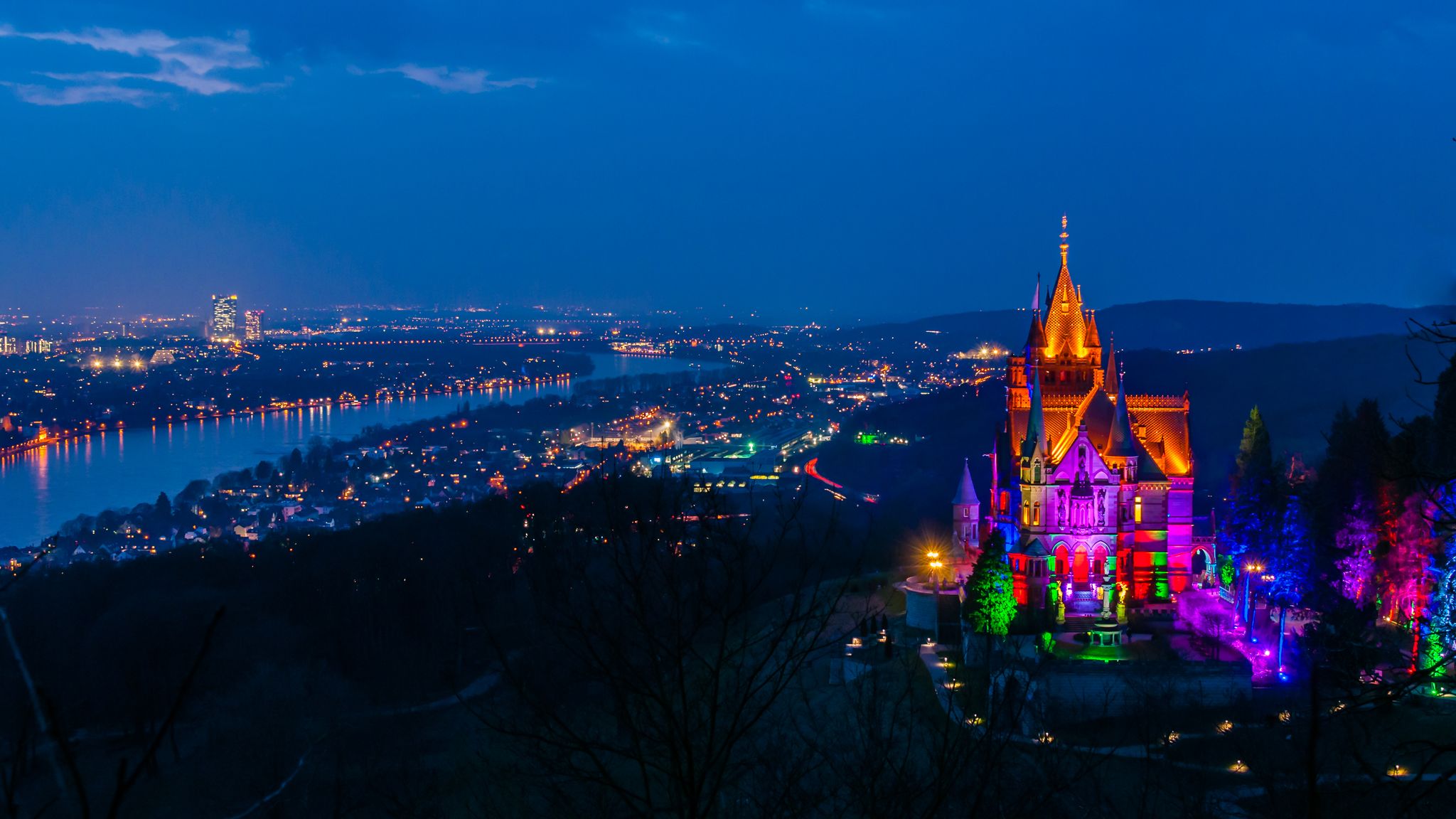 Illuminated Drachenburg Castle at night
