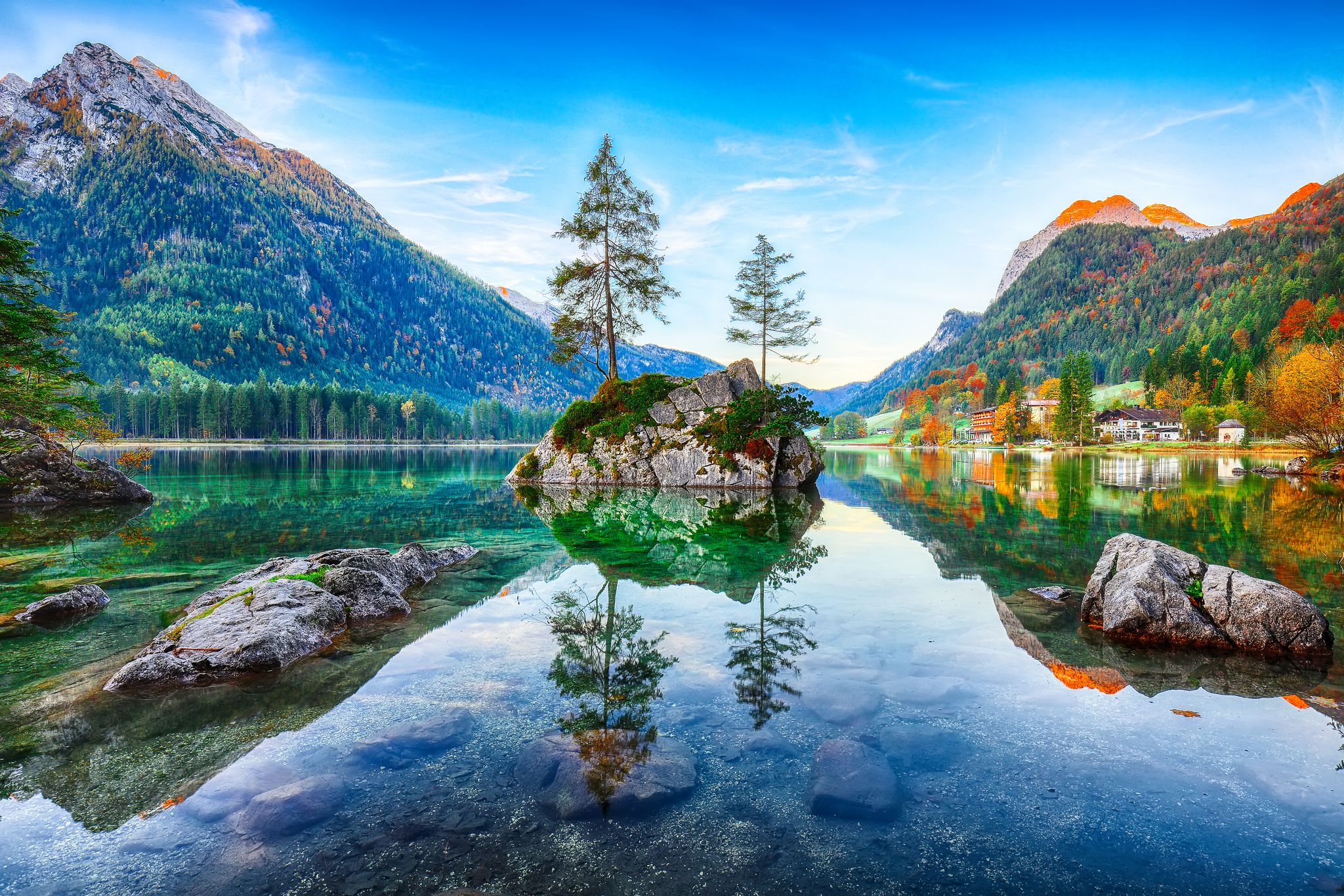 Photo of Fantastic autumn sunrise of Hintersee lake. Beautiful scene of trees on a rock island. Location: resort Ramsau, National park Berchtesgadener Land, Upper Bavaria, Germany Alps, Europe .