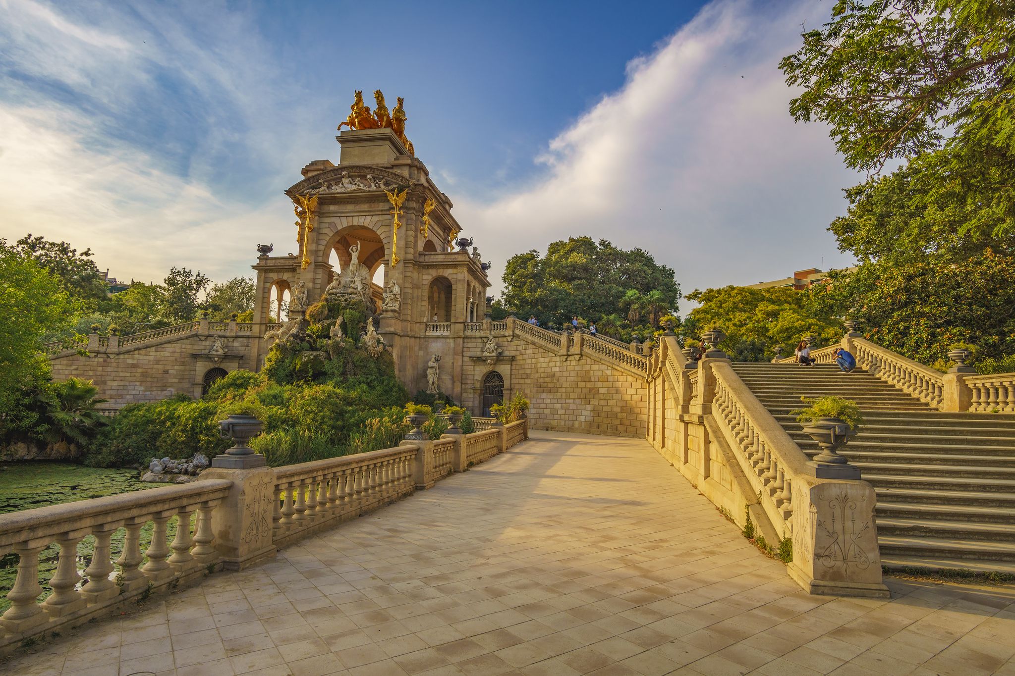 Photo of Cascada del Parque de la Ciudadela. Close up shot of monument in popular Barcelona Ciutadella Park in sunset .