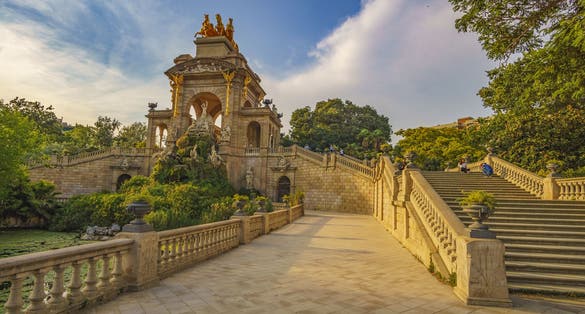 Photo of Cascada del Parque de la Ciudadela. Close up shot of monument in popular Barcelona Ciutadella Park in sunset .