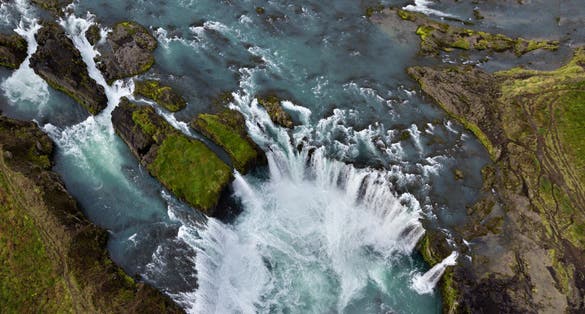 photo of skyview of godafoss (Goðafoss) waterfall. It one of the spectacular waterfalls in Iceland. Skjálfandafljót river. Aerial photography captured by drone.