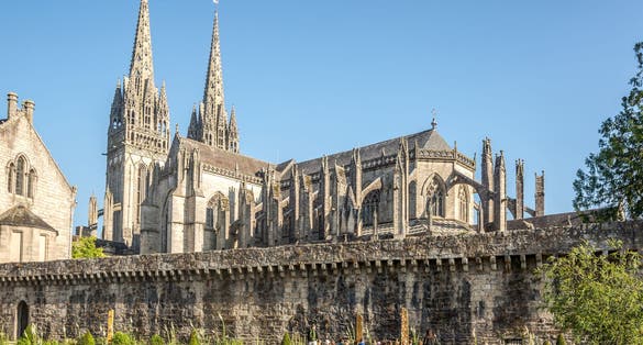 Photo of the Cathedral of Saint Corentin in the streets of Quimper - France.