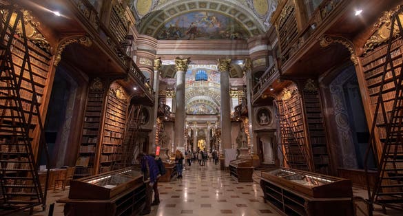 Photo of Interior of the Austrian National Library located in the Neue Burg Wing of the Hofburg palace, Vienna, Austria.