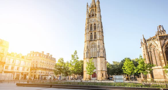 photo of morning view on the square with Tour Pey-Berland in Bordeaux city, France.