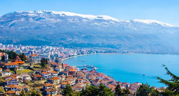 Photo of aerial view of Macedonian city Ohrid, which is famous for its unesco listed historical center and beautiful lake separating Macedonia from Albania.