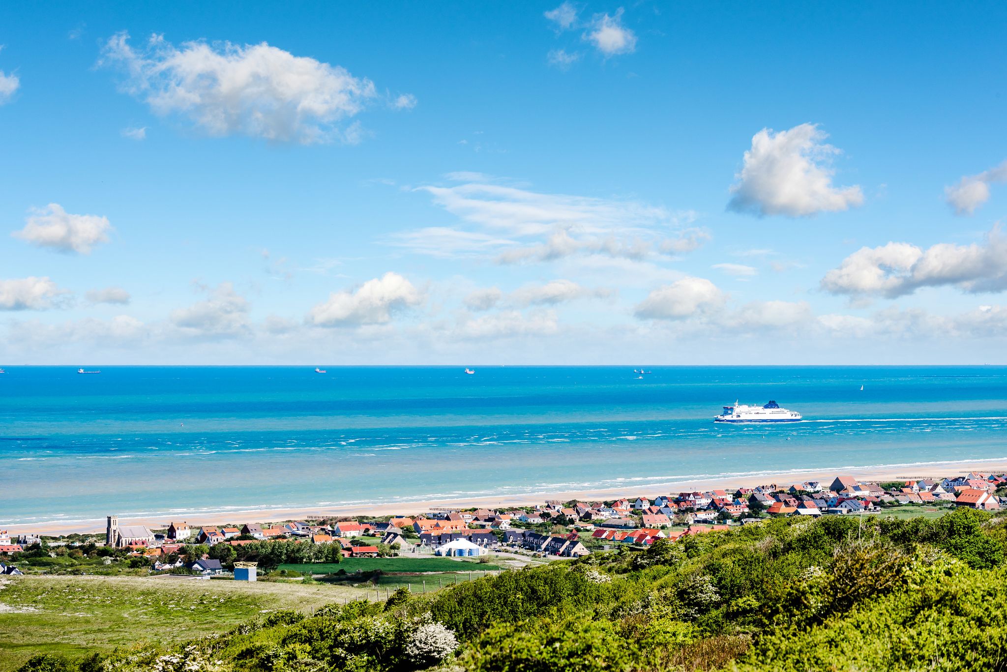 Ferry on the horizon crossing the sea between Calais and Dover